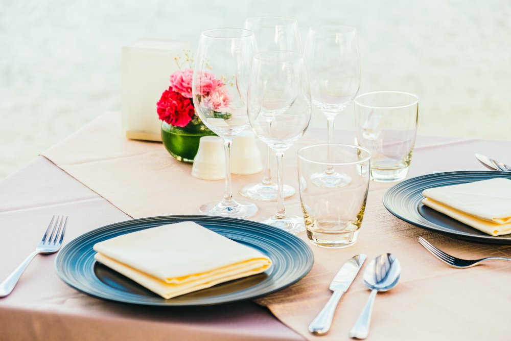 Elegant formal dining table with professional setting